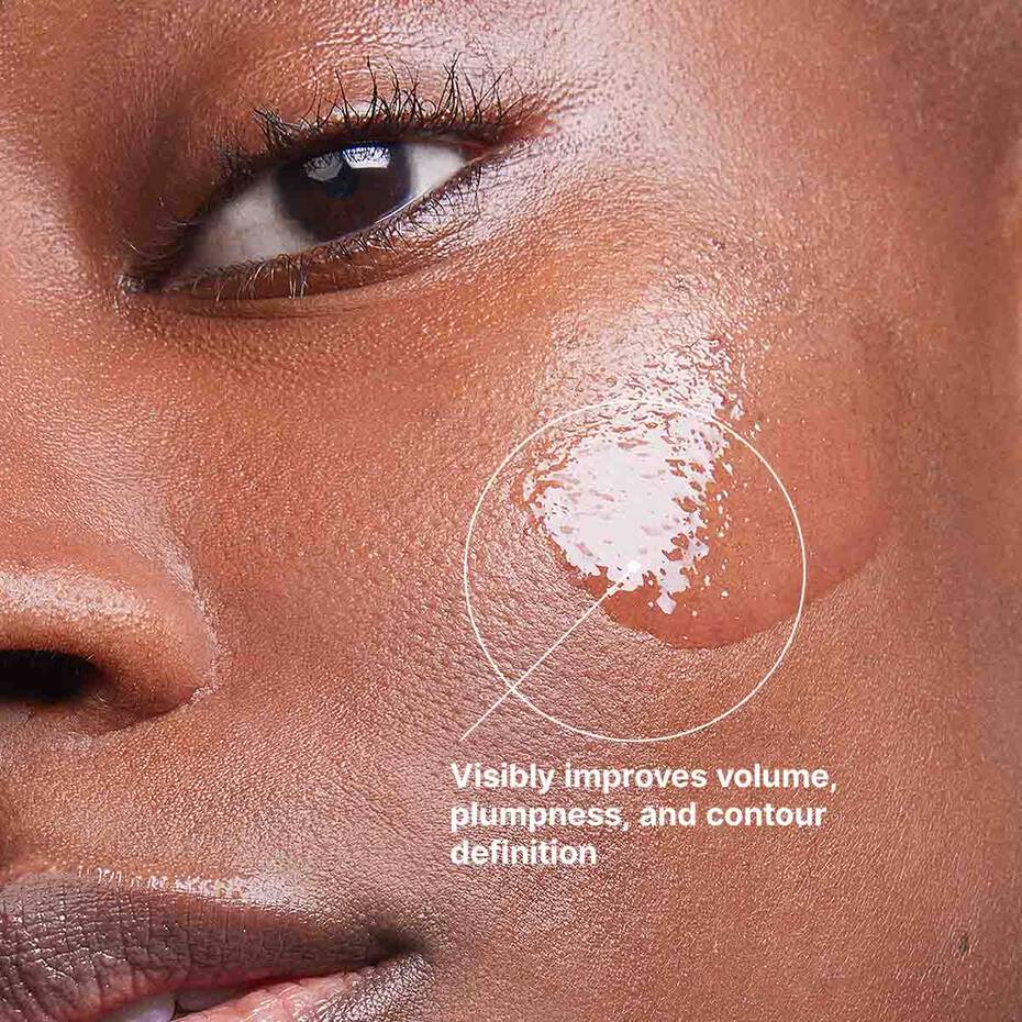 Close-up of a person's eye with a cosmetic product applied, highlighting improvements in volume, plumpness, and contour definition.