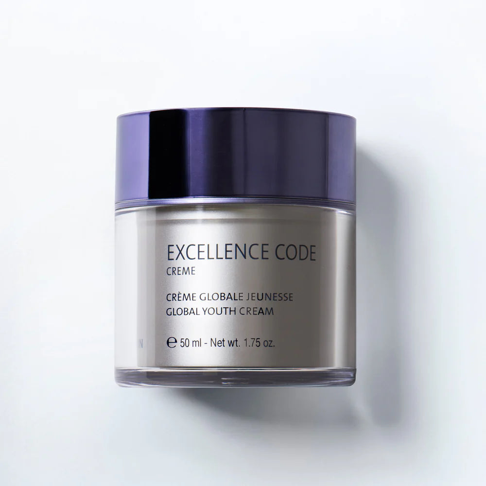 Skincare cream jar labeled 'Excellence Code' on a light gray background