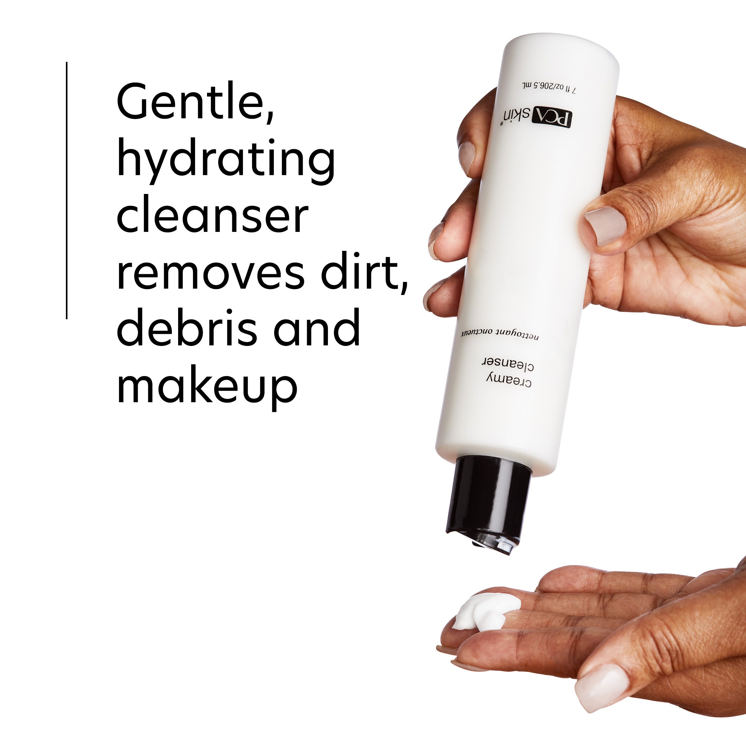 Hand holding a skincare cleanser bottle with text about its benefits on a white background