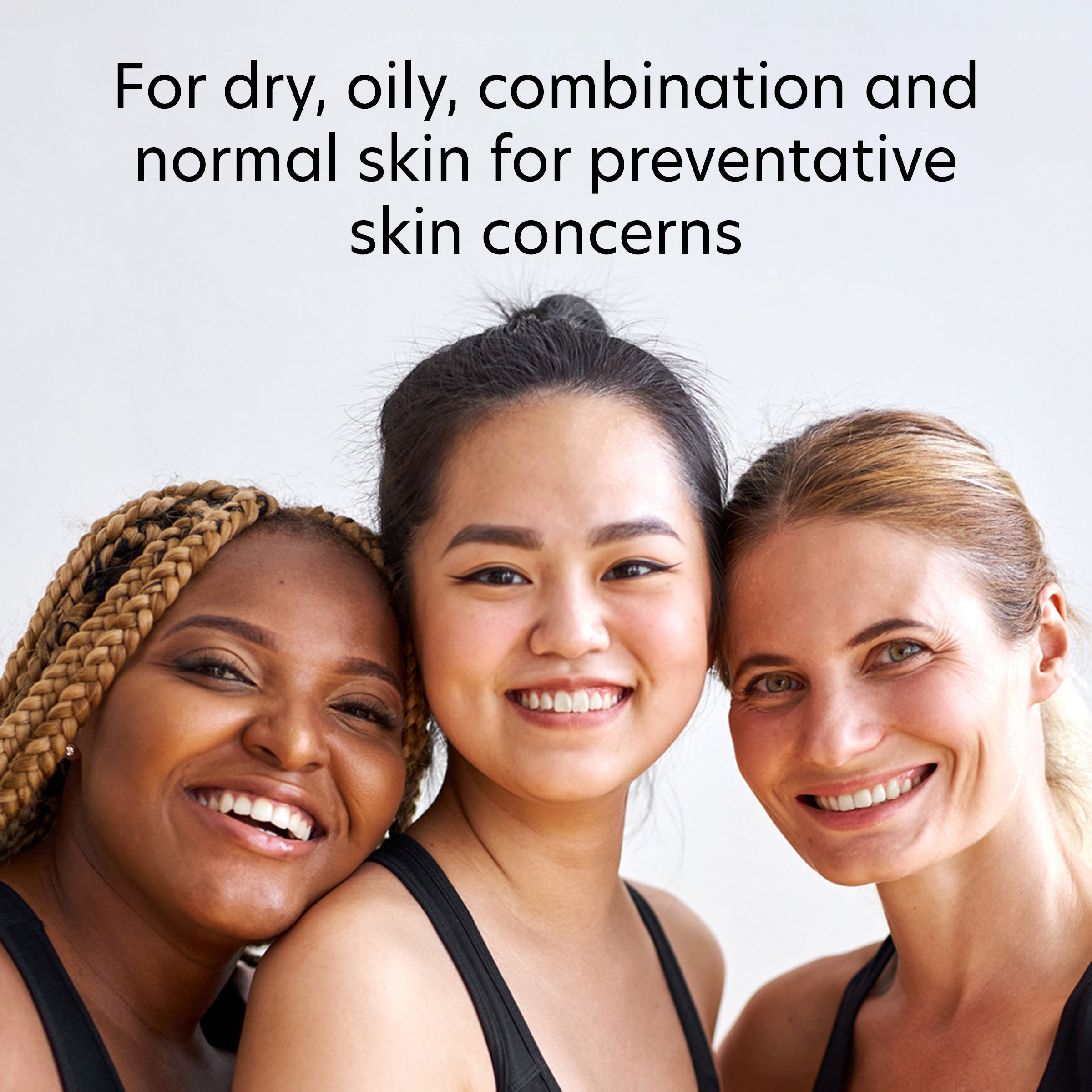 Three women with different skin tones smiling together, with text about skin care for various skin types.