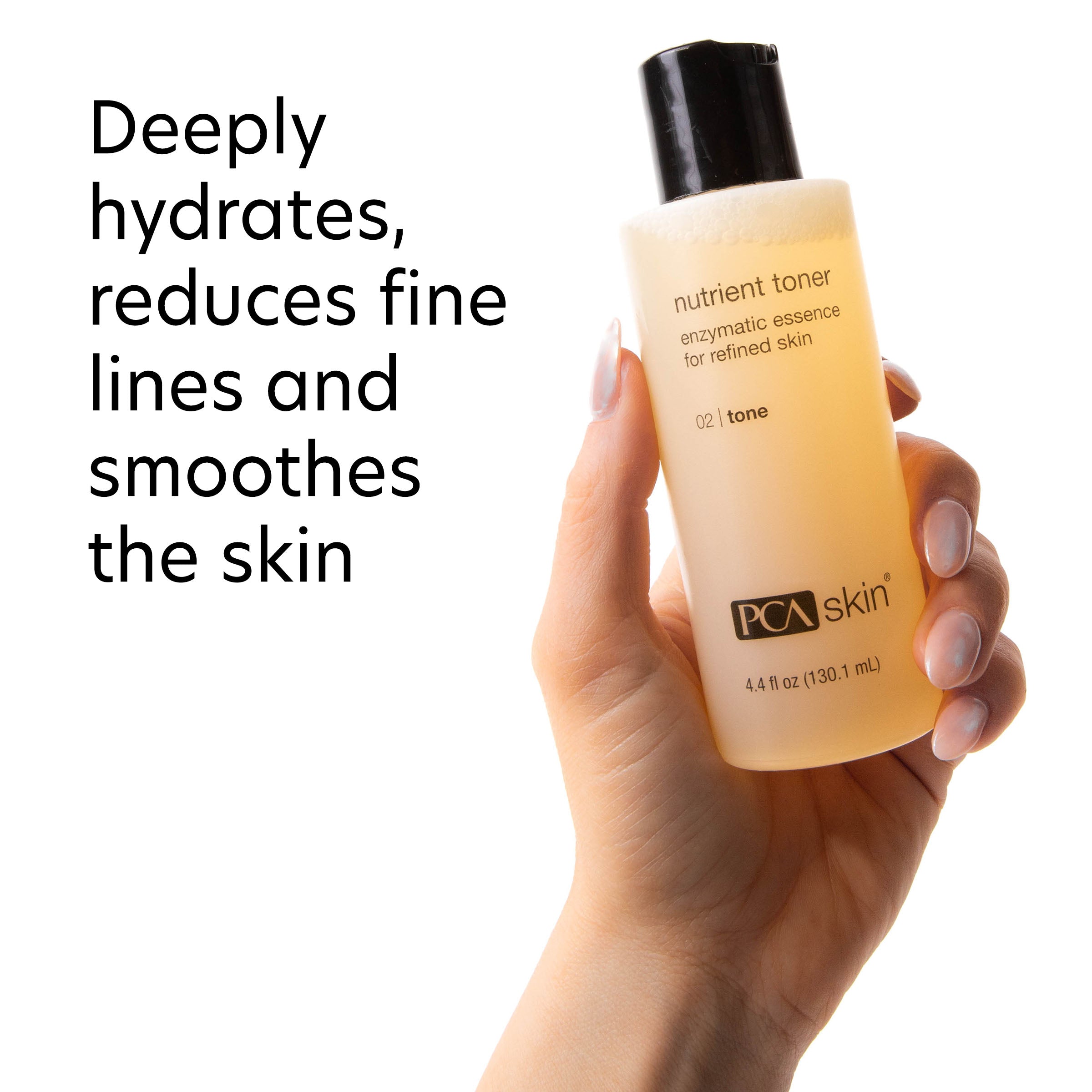 Hand holding a PCA Skin toner bottle with product description text on a white background